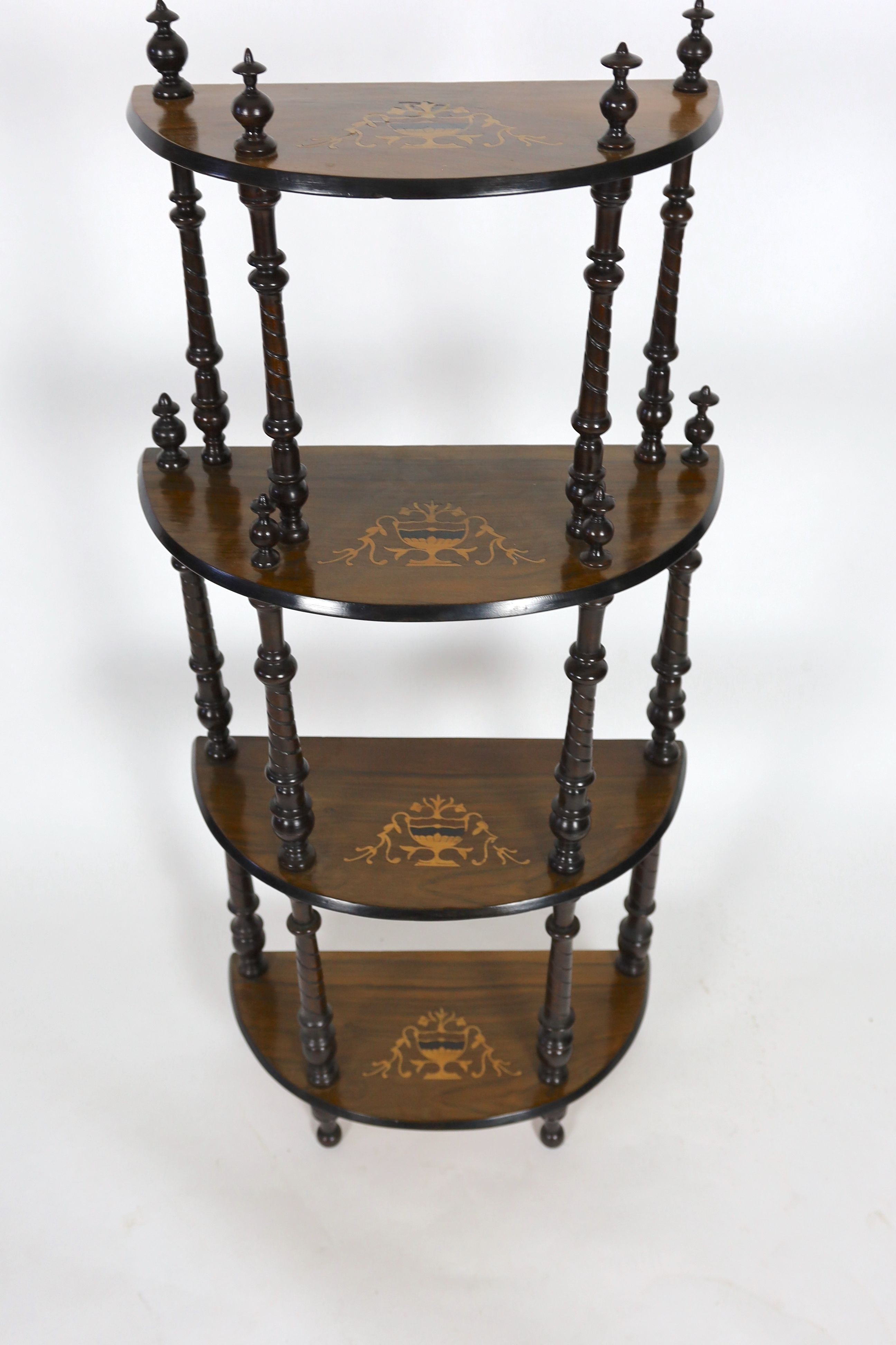 A late Victorian inlaid walnut D shaped four tier whatnot, width 59cm depth 28cm height 129cm